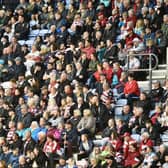 Wigan Warriors fans at the DW Stadium for the game against Warrington Wolves.