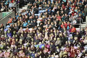 Wigan Warriors fans at the DW Stadium for the game against Warrington Wolves.