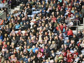 Wigan Warriors fans at the DW Stadium for the game against Warrington Wolves.