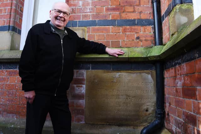 Coun George Davies outside Wigan Infirmary