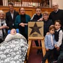 Joseph Kendrick and family members unveil the star