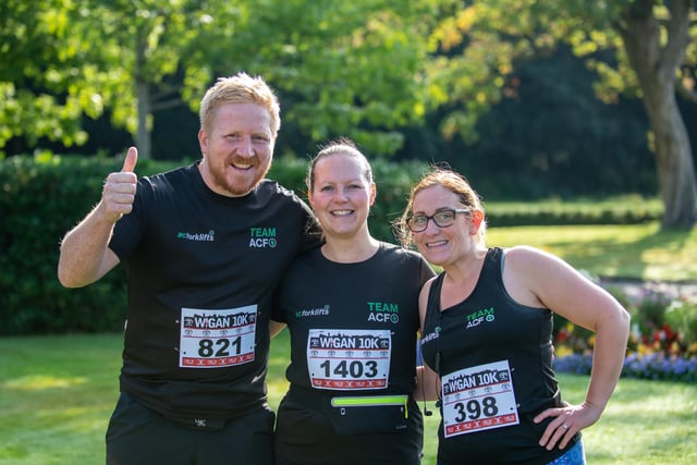 The 10th annual Wigan 10k, Mesnes Park Wigan. Pictured; Team AFC (Left to Right) Lee Clark, Claire Billington, Emily Lunt.