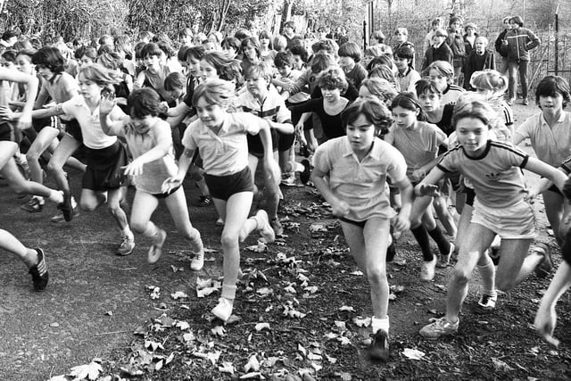 The start of a Wigan schoolgirls cross country race at Wigan Rugby Union Club on Tuesday 15th of November 1983.