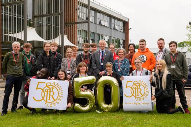 St John Rigby College students, principal Peter McGhee and staff celebrate the 50th anniversary.