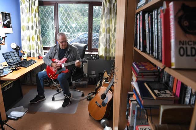 Author Nick Oldham switches off from writing with his guitars