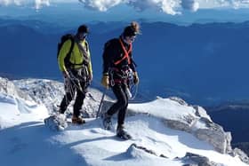 Bobby and Marie hiking up Triglav, the highest mountain in Slovenia