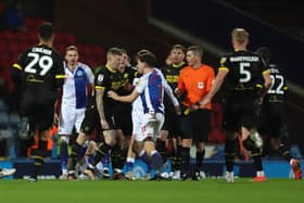James McClean and Joe Rankin-Costello go eye-to-eye at Ewood Park
