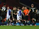 James McClean and Joe Rankin-Costello go eye-to-eye at Ewood Park