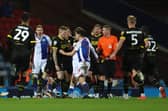 James McClean and Joe Rankin-Costello go eye-to-eye at Ewood Park