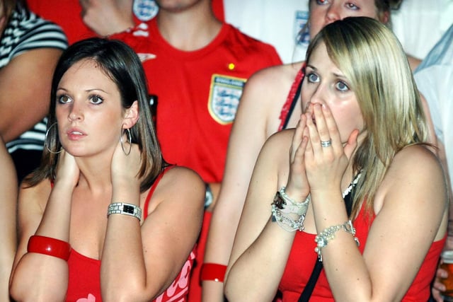 Shocked fans reaction in Walkabout as England lose on penalties against Portugal. 