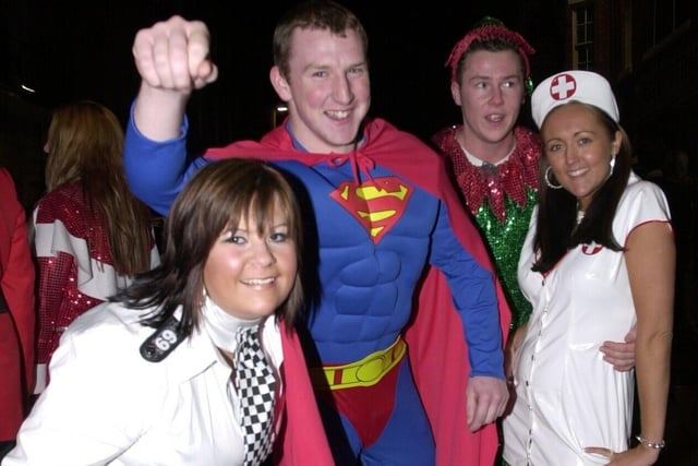 Superman, Police girls and nurses were on hand along Wigan's King St on Boxing Day for the  annual  fancy dress night 2004