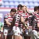 Wigan Warriors celebrate Kaide Ellis' first try for the club