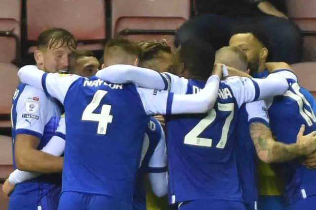 The Latics squad are remaining together off the field as well as on it