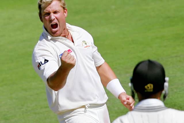Australian spinner Shane Warne punches the air after dismissing New Zealand batsman Chris Martin as he takes five wickets on the fourth day of the first Test between the sides in 2005. Picture: William West/AFP via Getty Images