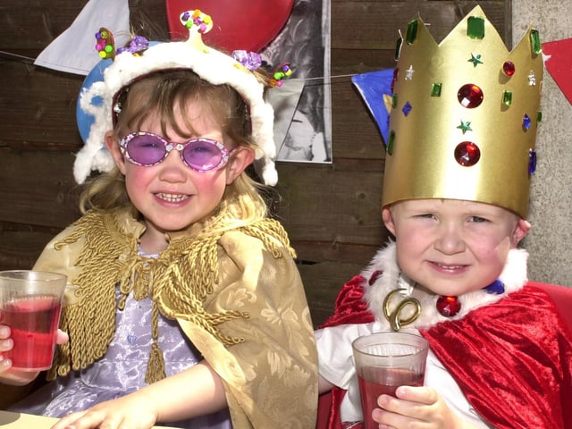 The king and queen in regal robes are Courtney Brown and Lewis Harrison at the Just Learning Nursery, Wigan, Queen's Golden Jubilee party on Friday 31st of May 2002.