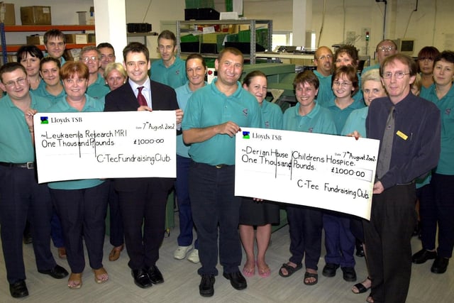 Staff of C-Tec, Steven's Way, Goose Green, present £1,000 each to Dr Bryson Potinger Heamatology Registrar at Manchester Royal for Leukaemia research and to David Wilde authorised volunteer for Derian House, the cheques were handed over by Pat Sanders and Stephen Collier.