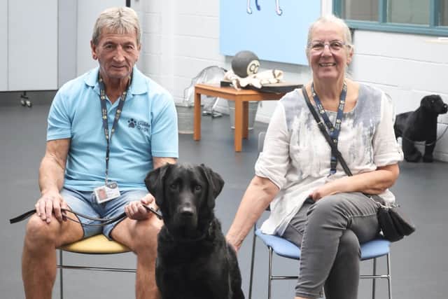 Terry and Margaret Pemberton with dog in training: Charlie
