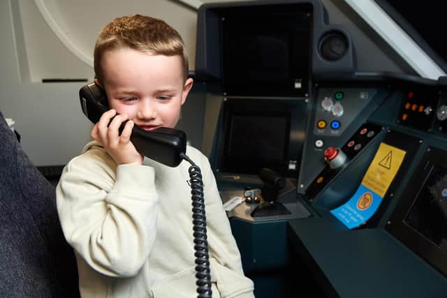 Five-year-old Daniel Rogerson learns about life as a train driver