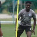Michael Olakigbe has suffered a broken leg just days into his Latics career