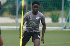 Michael Olakigbe has suffered a broken leg just days into his Latics career