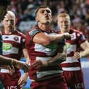 Wigan Warriors hooker Brad O'Neill celebrates his try against Catalans Dragons