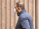 Akeel Kadir arriving for a hearing at Liverpool Crown Court