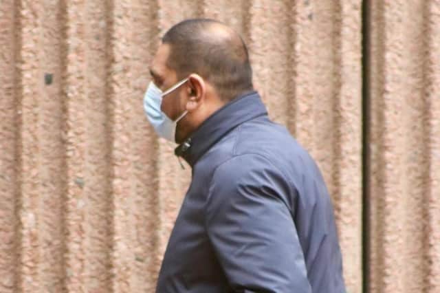 Akeel Kadir arriving for a hearing at Liverpool Crown Court