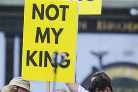 Anti-monarchy protesters before for the National Service of Thanksgiving and Dedication for King Charles III and Queen Camilla. Picture: Lisa Ferguson