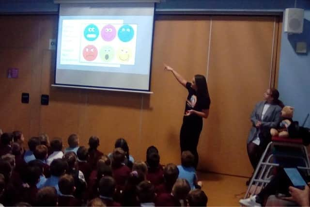 Amy Madden delivering one of her talks