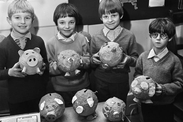 Pupils with their papier mache piggy banks are Stephen Thompson, Ian Lorimer, Lee Cumming and Robin Groves at St. James Road County Primary School, Orrell, on Tuesday 8th of February 1972.