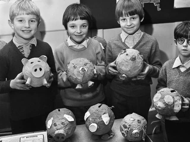 Pupils with their papier mache piggy banks are Stephen Thompson, Ian Lorimer, Lee Cumming and Robin Groves at St. James Road County Primary School, Orrell, on Tuesday 8th of February 1972.