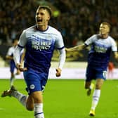 WIGAN, ENGLAND - OCTOBER 11: Nathan Broadhead of Wigan Athletic celebrates after scoring their sides first goal during the Sky Bet Championship between Wigan Athletic and Blackburn Rovers at DW Stadium on October 11, 2022 in Wigan, England. (Photo by Clive Brunskill/Getty Images)