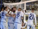 The Latics players celebrate at Portsmouth before it all went wrong