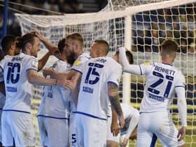 The Latics players celebrate at Portsmouth before it all went wrong