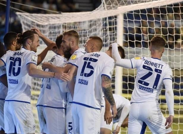 The Latics players celebrate at Portsmouth before it all went wrong