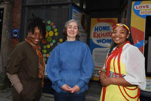 Artist Rebecca May, centre, with Elva Douglas, left, and Miki Shika, right, who were involved in the artwork Home Ekhaya Wom