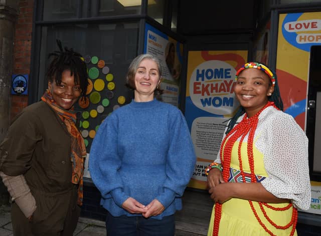 Artist Rebecca May, centre, with Elva Douglas, left, and Miki Shika, right, who were involved in the artwork Home Ekhaya Wom