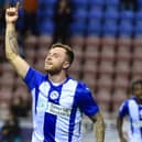 Dale Taylor celebrates his second goal for Latics in the 3-0 victory over Peterborough