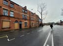 The three Victorian townhouses are in New Market Street, Wigan