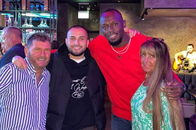 Usain Bolt meets fans at Rendezvous restaurant and bar