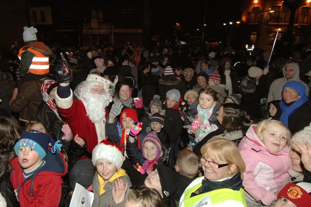 Golborne Christmas lights switch-on:  Father Christmas, brought along by The Rotary Club of Golborne Lightshaw, with local children