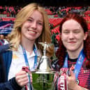 Ruby Hunter (left) and Eva Hunter (right) celebrate Wigan Warriors' win in the Women's Challenge Cup final at Wembley Stadium
