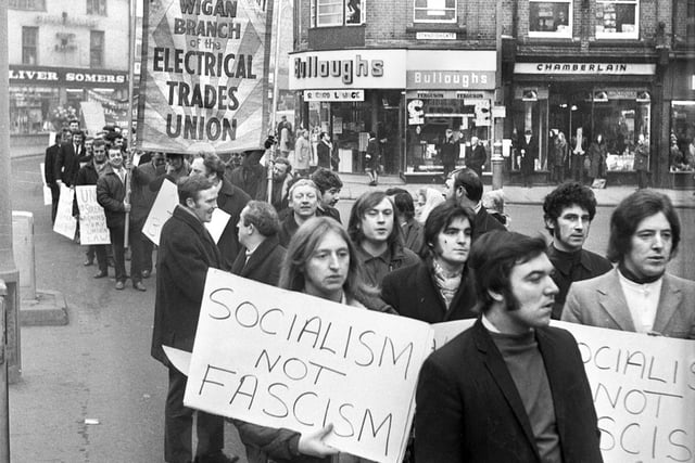 Members of the Wigan branch of the Electrical Trades Union march through Wigan town centre in 1971.
