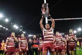 Kai Pearce-Paul celebrates with the Super League trophy