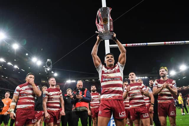 Kai Pearce-Paul celebrates with the Super League trophy