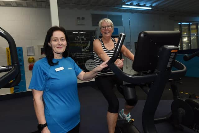 Carol Winstanley, left,  lost 11 stone and this inspired her to become a personal trainer, pictured at Total Fitness Wigan.