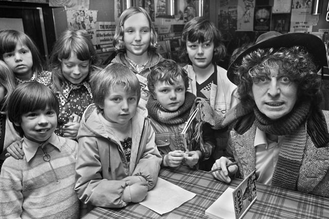 Young fans were not quite sure what to make of Dr. Who, alias actor Tom Baker, when he landed at a Wigan town centre newsagents to sign autographs and publicise the new Dr. Who book in April 1976.