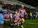 Liam Farrell leads out Wigan Warriors