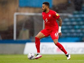 Jordan Cousins in action for Latics