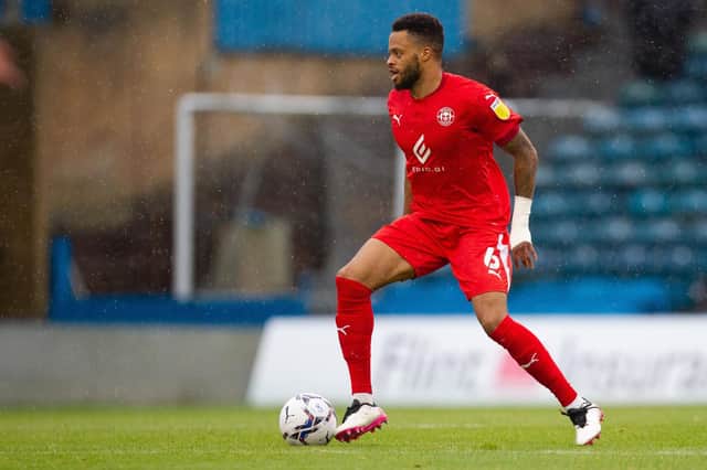 Jordan Cousins in action for Latics